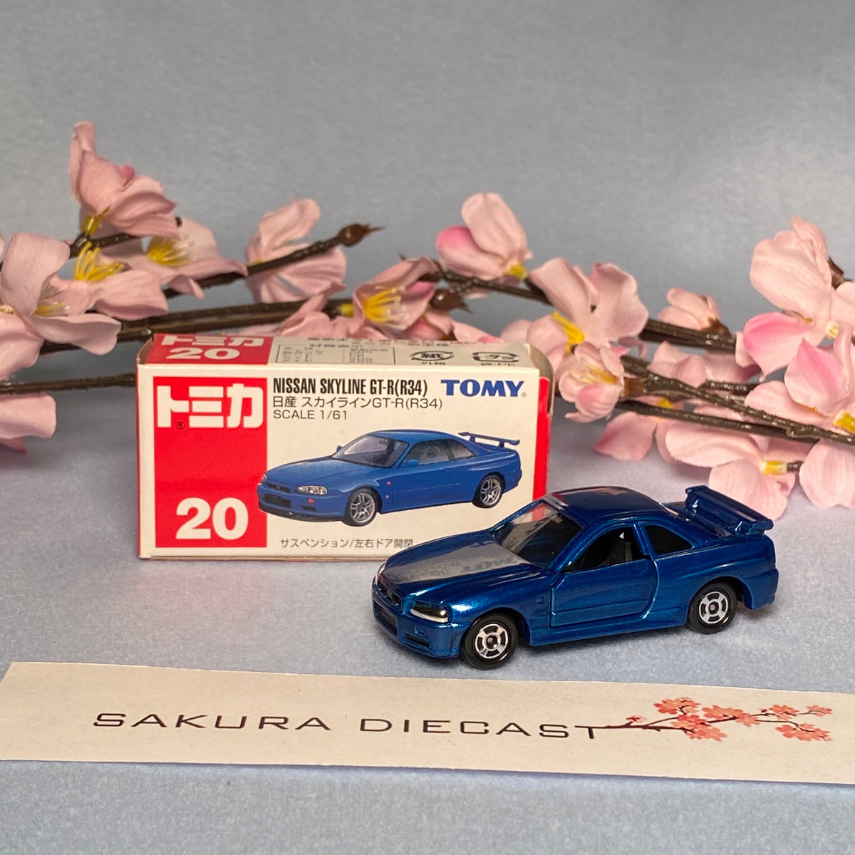 1/64 Tomica Nissan Skyline GT-R (R34) – Sakura Diecast