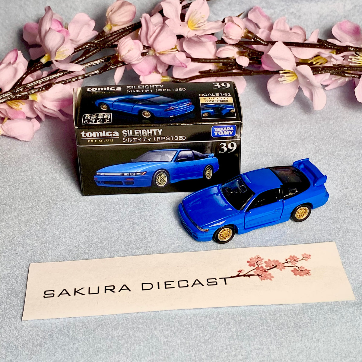 1/64 Tomica Premium Nissan Sileighty – Sakura Diecast